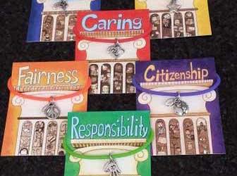 Character Counts:  Symbol Charm Bracelets Reinforce Learning