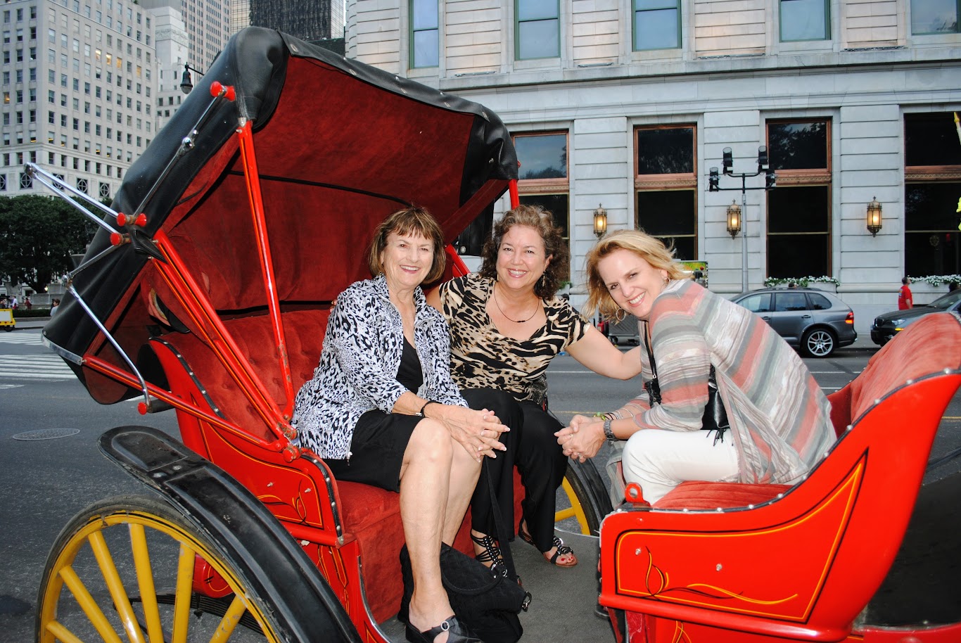 Kay McDonald, Debbie Howard, and Sidna Merseau in a horse-drawn carriage in New Orleans