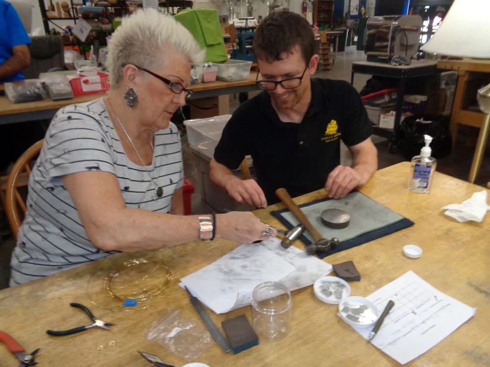 SEEDs for Autism instructor and participant working on jewelry.