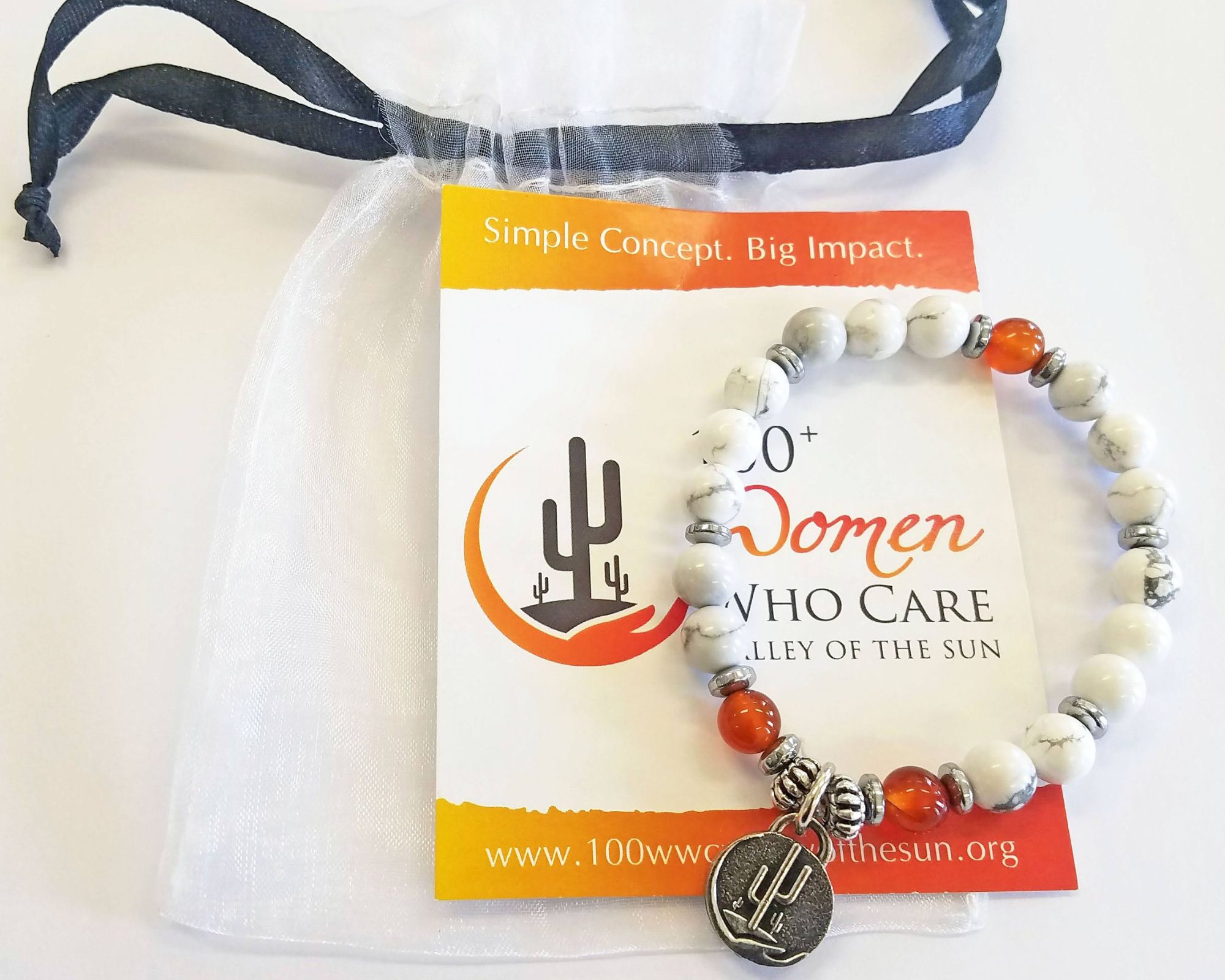 woman wearing KNOW Women 'women supporter' necklace
