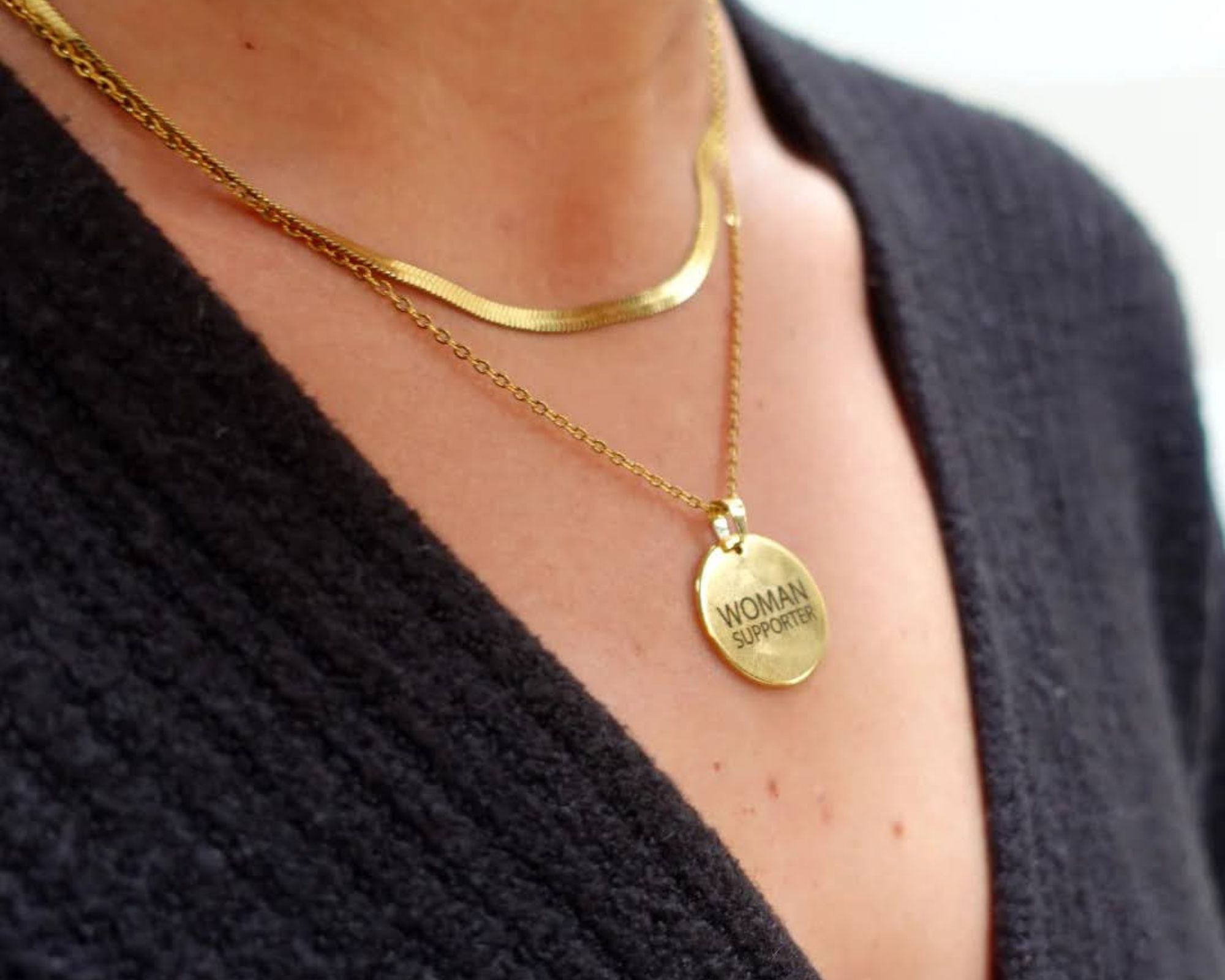 woman wearing KNOW Women 'women supporter' necklace