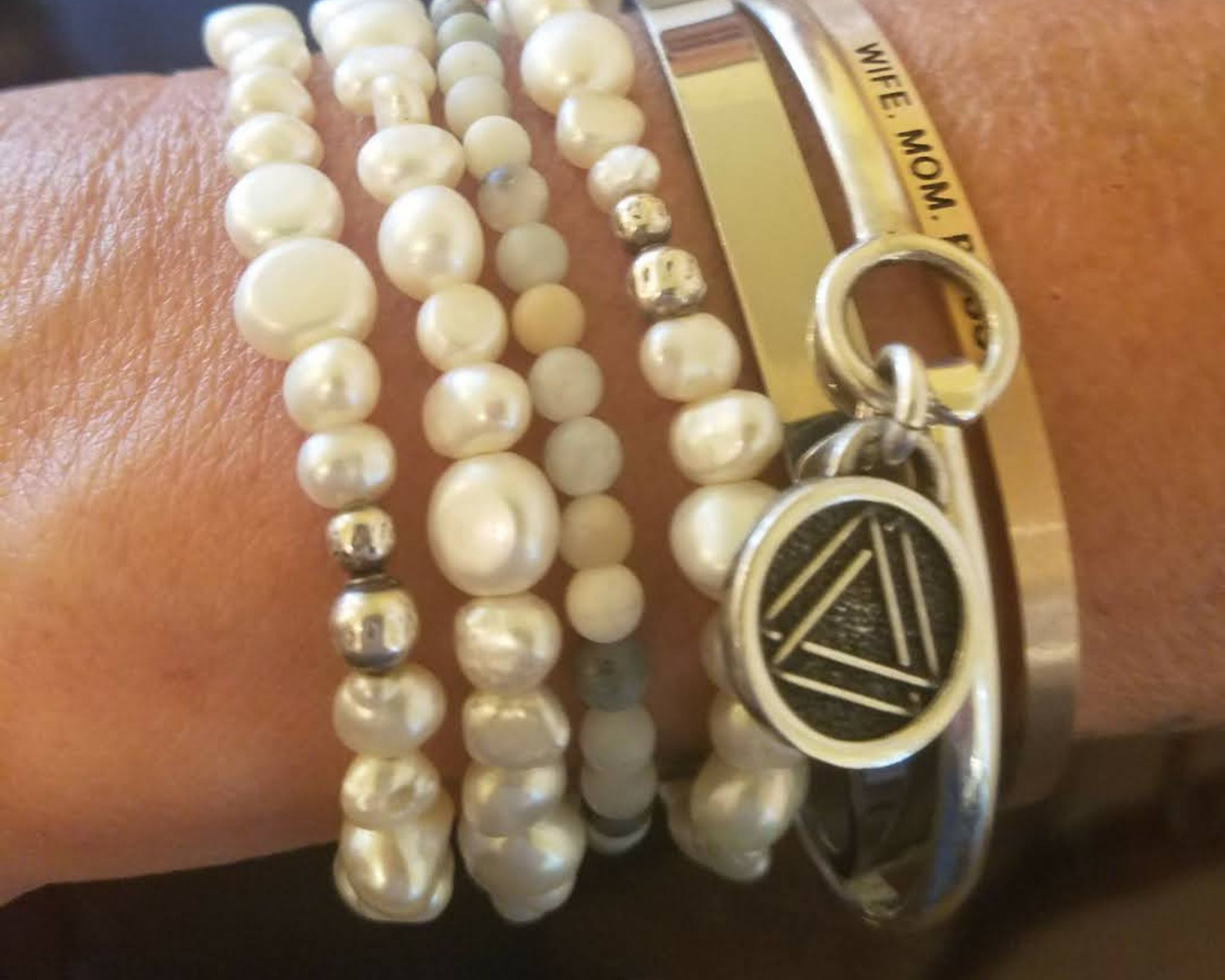 woman wearing WATT membership bracelet